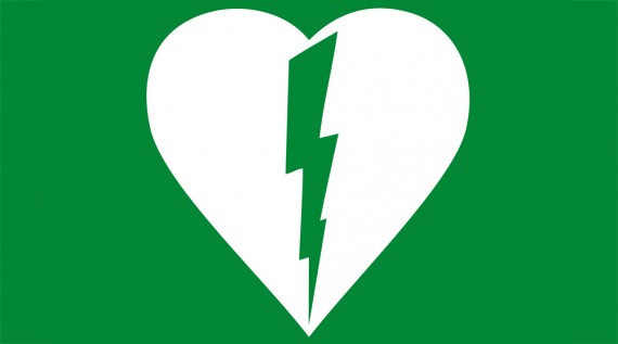 AED symbol - white heart with lightning bolt on green background